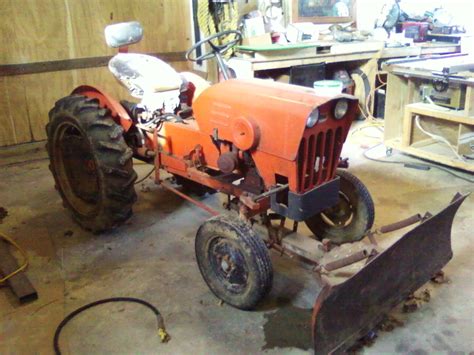 When he purchased it he got the front blade that you see here in the picture, a 48" belly mower which lasted about 22 years but was beyond repair, and a garden plow which still works great. . Power king tractor restoration
